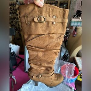 Sued tobacco colored knee high boots. Pristine condition.